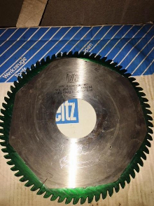 New and newly sharpened panel saw blades