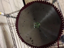 New and newly sharpened panel saw blades
