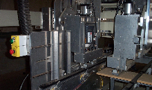 Drawer Box machine with miter folding heads for Doweled drawers and v Grooving for meter folding final drawer boxes.