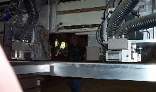 Drawer Box machine with miter folding heads for Doweled drawers and v Grooving for meter folding final drawer boxes.