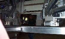 Drawer Box machine with miter folding heads for Doweled drawers and v Grooving for meter folding final drawer boxes.