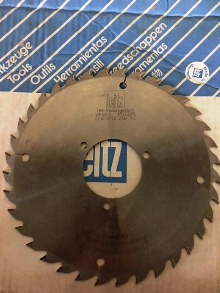New and newly sharpened panel saw blades