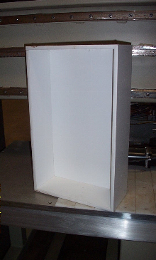 Drawer Box machine with miter folding heads for Doweled drawers and v Grooving for meter folding final drawer boxes.