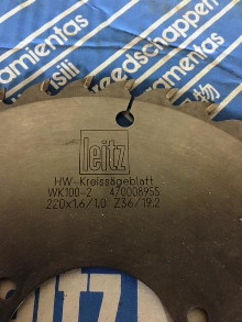 New and newly sharpened panel saw blades