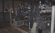 Drawer Box machine with miter folding heads for Doweled drawers and v Grooving for meter folding final drawer boxes.