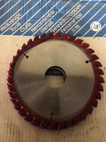 New and newly sharpened panel saw blades