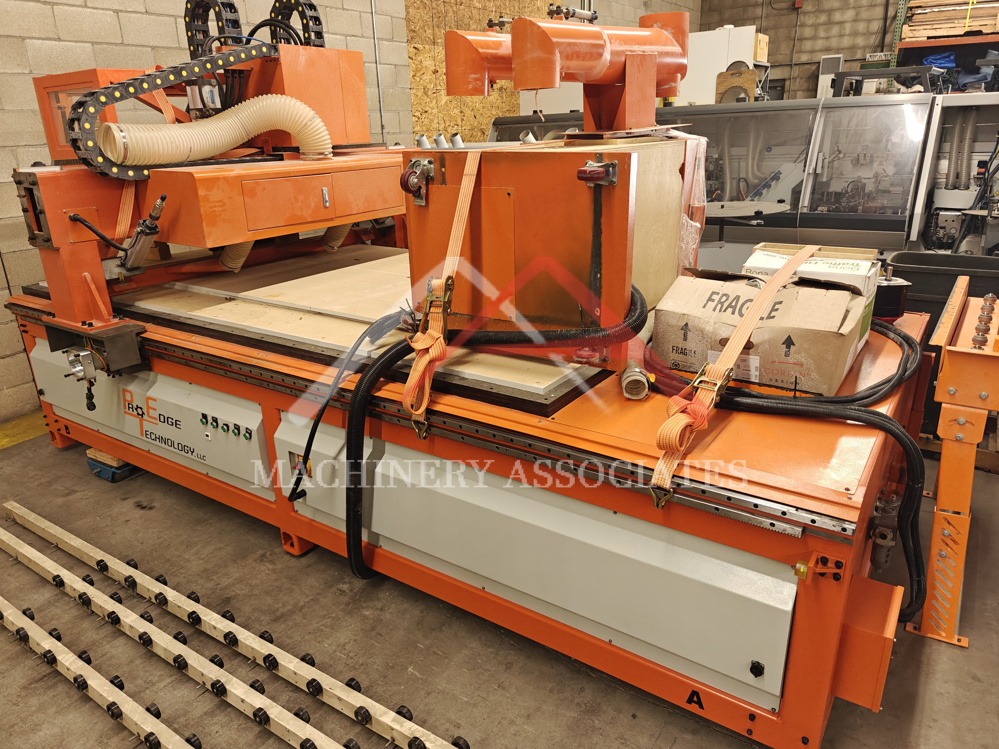 Pro Edge 5x10 CNC Router with Pushoff and Ball type conveyors