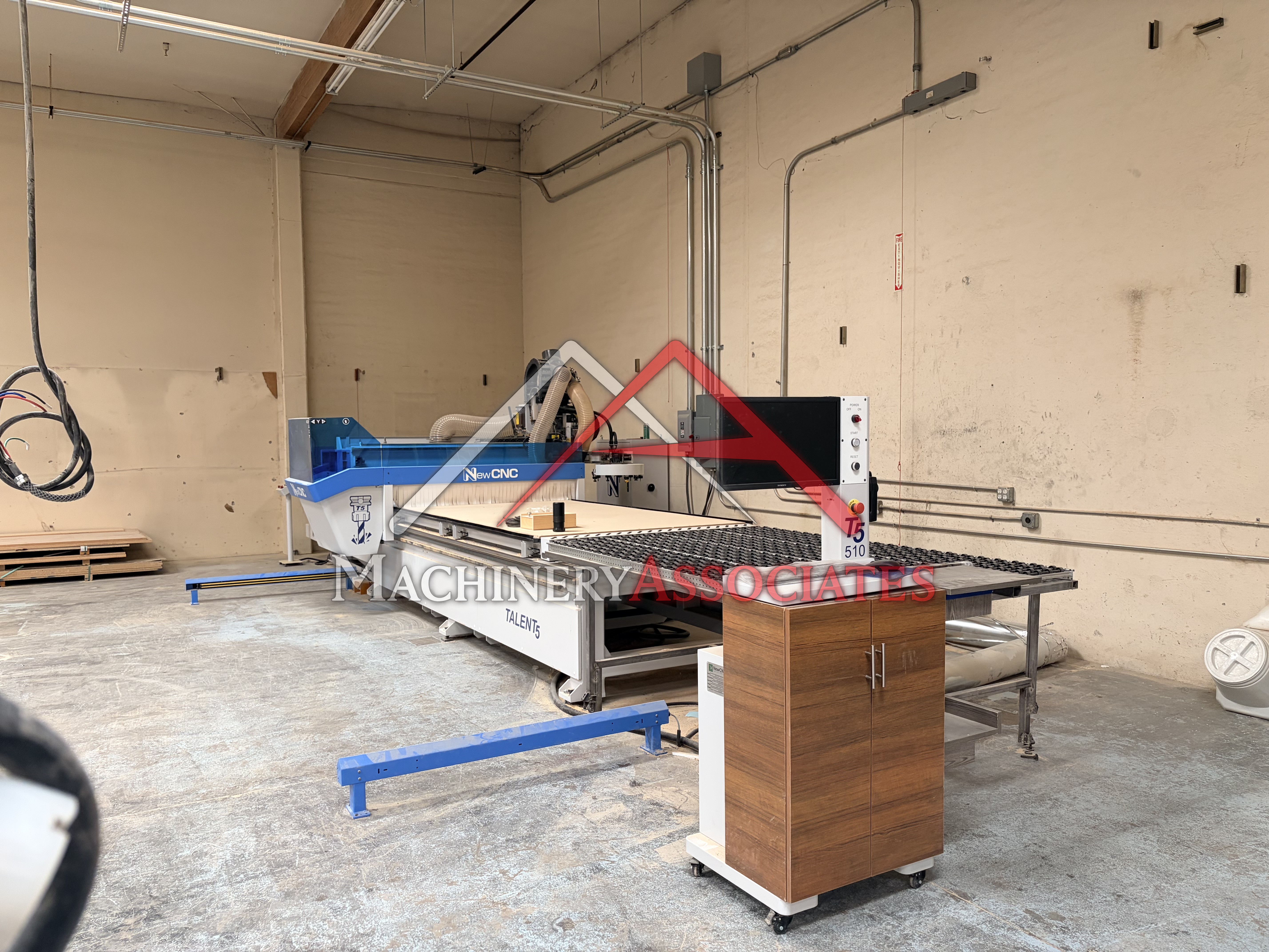 NewCNC Brand CNC Router. Auto infeed and offloading