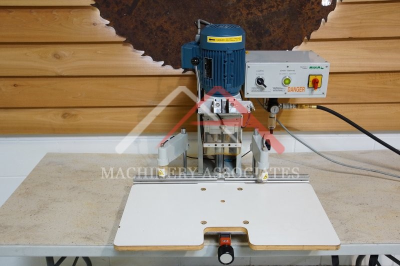 LOW USE 2002 OMAL INSERT C HINGE BORING AND INSERTION MACHINE 