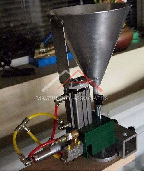 Unique Machinery - Pneumatic Space Ball Inserter Machine