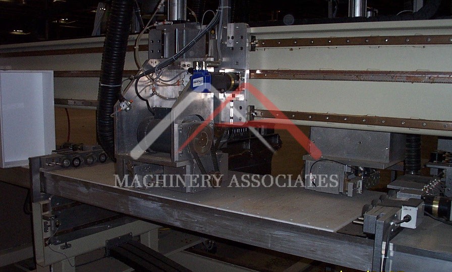 Drawer Box machine with miter folding heads for Doweled drawers and v Grooving for meter folding final drawer boxes.