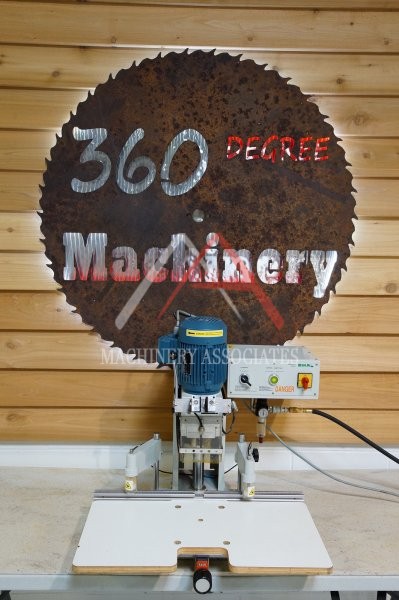 LOW USE 2002 OMAL INSERT C HINGE BORING AND INSERTION MACHINE 