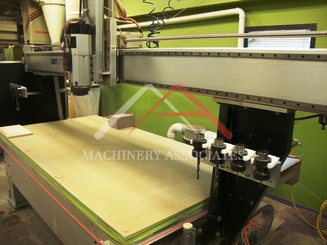 CNT Motion Systems 1000 Series CNC Router, 4'x8' Table, 11HP Spindle 8 Station Auto Tool Changer, HSK 63F Tooling, 15HP Vacuum Pump, 24' Z Axis Travels